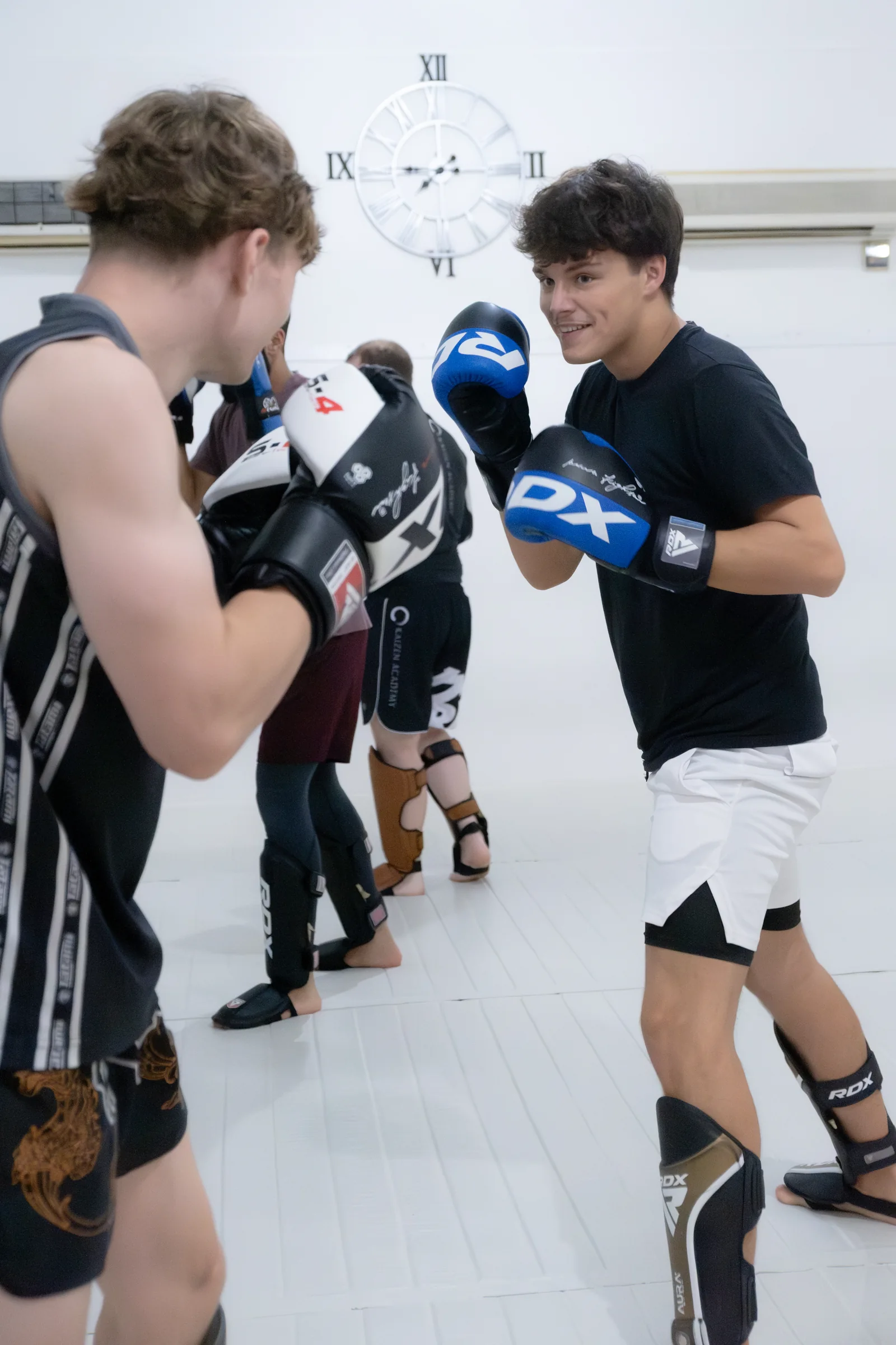 Members practising kickboxing at the academy